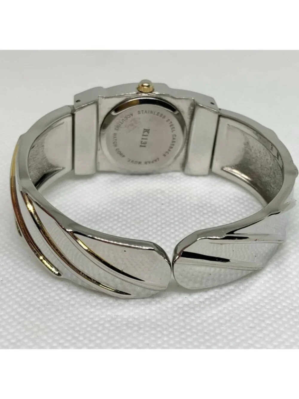 Vivani women’s silver gold tone cuff bracelet watch 23mm quartz size 6” running